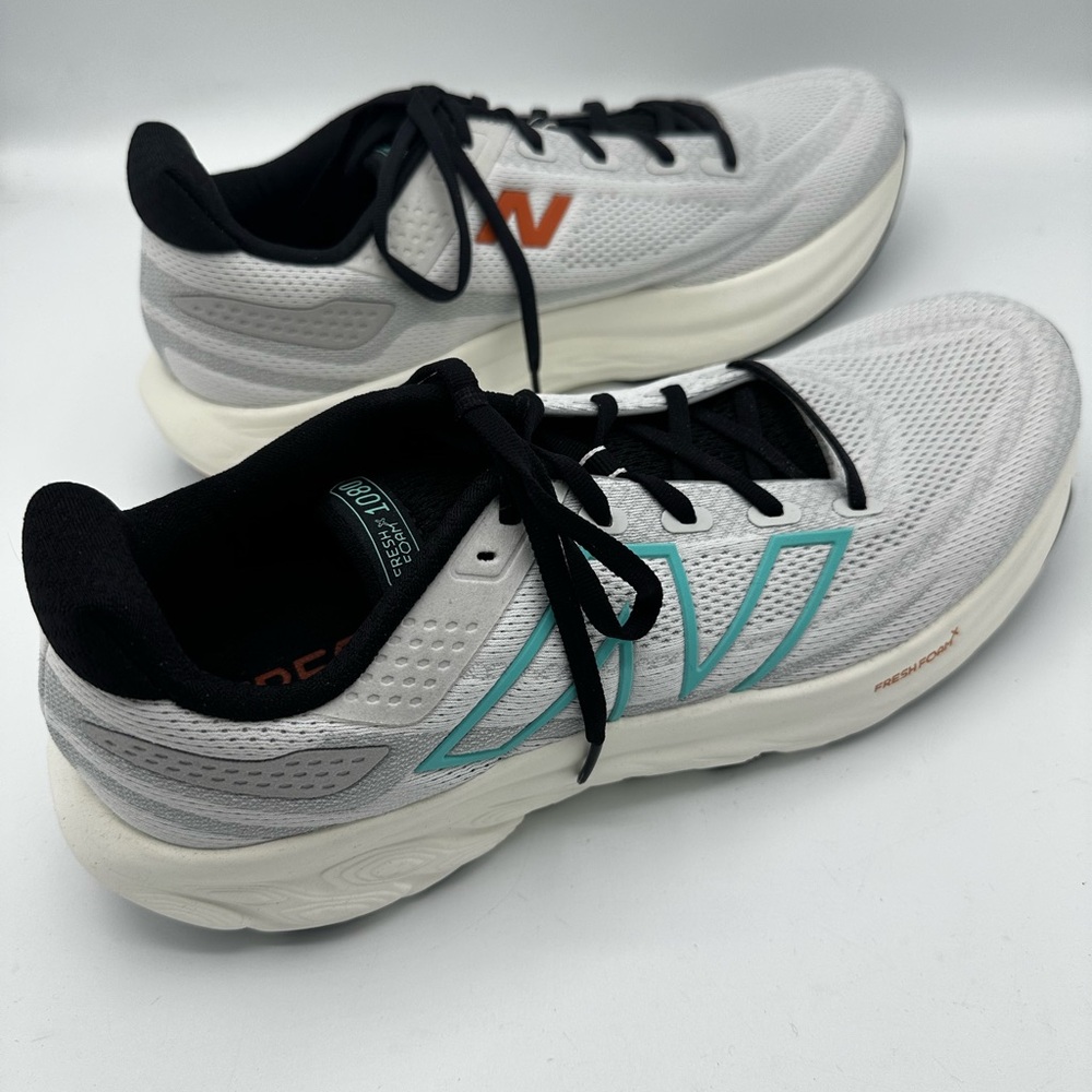 New Balance White and Black Shoes with Orange and Teal Highlights
